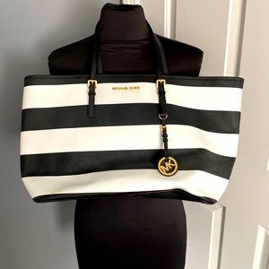 Michael Kors black and white striped handbag